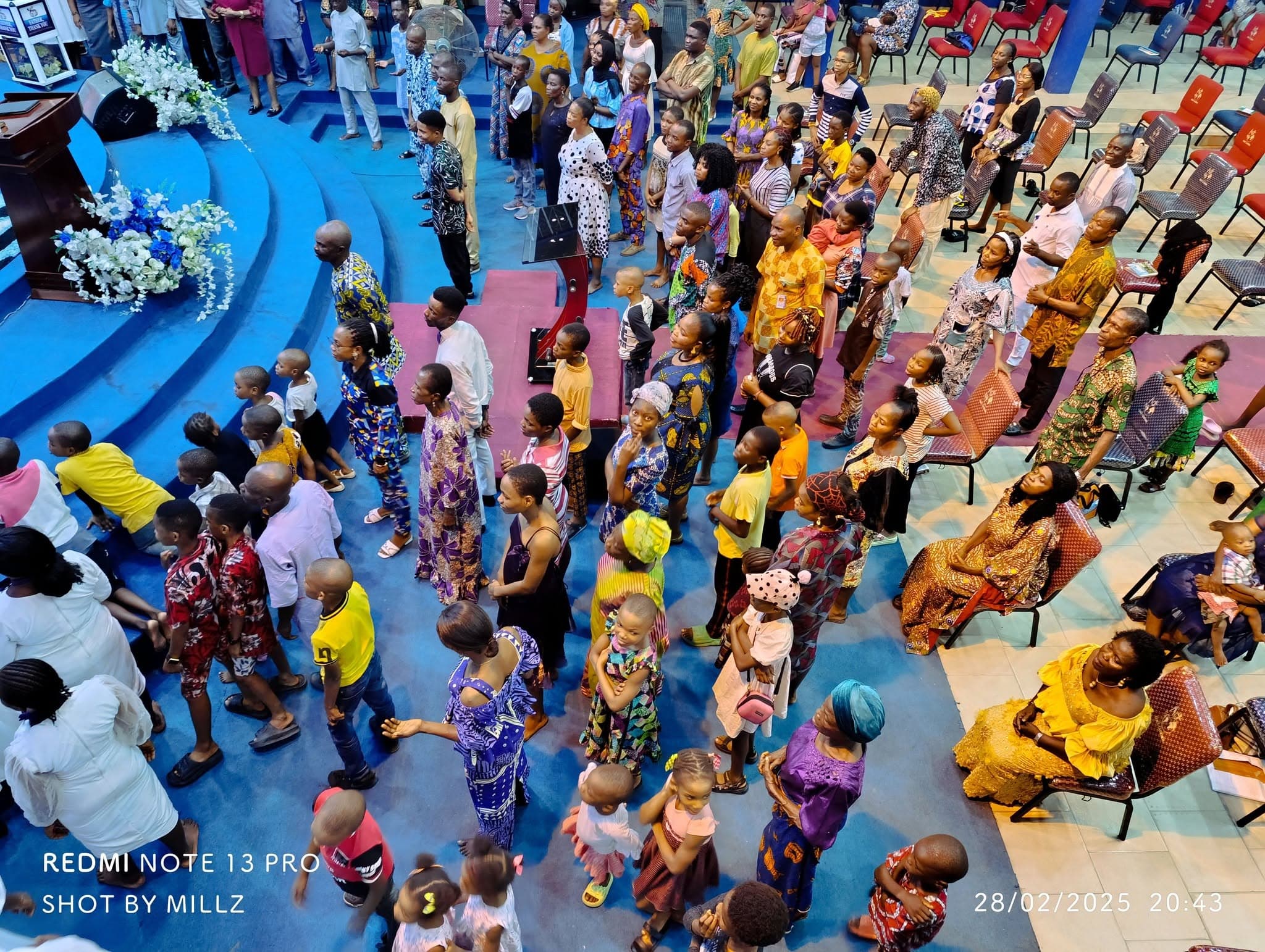 The congregation gathered at the altar during a service